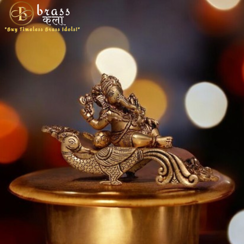 Brass Lord Ganesha Resting on peacock Couch